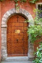 brown wooden front door rustic of new restored house entrance wood classic gate in europe france Royalty Free Stock Photo