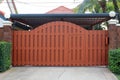 Brown, wooden Gate for property in Phuket Island in Thailand. Royalty Free Stock Photo