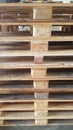 Brown wooden pallets for product distribution and transportation in warehouse
