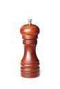 Brown wooden pepper mill on white background Royalty Free Stock Photo