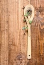 Brown wooden spoon on wood Royalty Free Stock Photo
