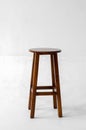 Brown wooden stool with four legs Royalty Free Stock Photo