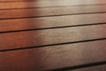 Brown wooden table texture in an orange sunset Royalty Free Stock Photo