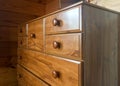 Brown wooden tall boy cabinet