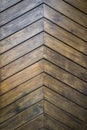 Brown wooden wall made of varnished panels with big knots as a natural background Royalty Free Stock Photo