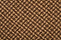 Brown wool houndstooth pattern. Royalty Free Stock Photo