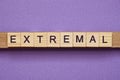 Brown word extremal in small square wooden letters