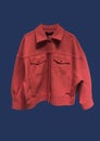 Brown worker style jacket wool blend jersey isolated on red background. Fashionable short coat with pockets