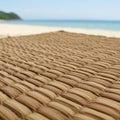 Brown Woven Beach Mat on Sandy Shore Royalty Free Stock Photo