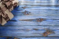 Brown wrapped birthday presents on vintage wooden board