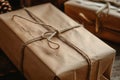 A brown wrapped gift box sitting on top of a table, awaiting its recipient, Vintage style gift box with brown paper and twine, AI Royalty Free Stock Photo