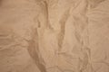 Brown wrinkled kraft paper background. Cardboard texture background Royalty Free Stock Photo