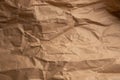 Brown wrinkled kraft paper background. Old cardboard texture background Royalty Free Stock Photo