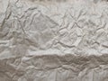 Brown wrinkled paper background, rumpled paper texture