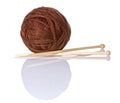 Brown Yarn Ball With Bamboo Knitting Needles