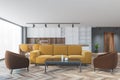 Brown and yellow apartment with sofa and kitchen, furniture on wooden parquet Royalty Free Stock Photo