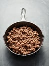 Browned ground beef in cast iron skillet