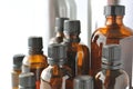 Brownglass bottles for cosmetic lotions, serums, oils Royalty Free Stock Photo