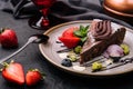Brownie cake with a scoop of vanilla ice cream and strawberries Royalty Free Stock Photo
