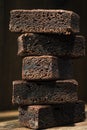 Brownie Cake Slices in Stack on Wooden Background Royalty Free Stock Photo
