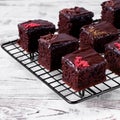 Brownie cakes with ganache and assorted toppings