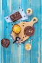 Brownie and Chocolate Cookie with Chocolate and Vanilla Desserts in Small Glasses Next to Chocolate Powder Spoon, Homemade Bakery