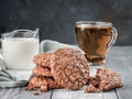 Brownie cookies on a wooden table with tea and milk. Copy space Royalty Free Stock Photo