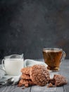 Brownie cookies on a wooden table with tea and milk. Copy space Royalty Free Stock Photo