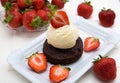 Brownie with ice cream and strawberries Royalty Free Stock Photo
