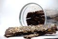 Brownie sticks in jar on white background,brownie sticks with almonds. Royalty Free Stock Photo