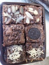 Brownies with almond, chocochips, oreo and cheese topping