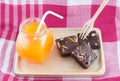 Brownies With Orange Juice On Wood Tray Royalty Free Stock Photo