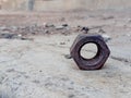 Brownish-black rusty iron nuts photographed with a blurred background Royalty Free Stock Photo