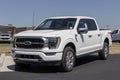 Ford F-150 Platinum display at a dealership. The Ford F150 is available in XL, XLT, Lariat, King Ranch, and Limited models