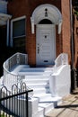 Brownstone Townhouse With Curved Stairs Entrance