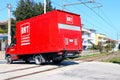 BRT Bartolini Express Courier truck in movment on railroad intersection. BRT Bartolini is an Italian express transportation