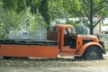 An Orange Vintage Truck