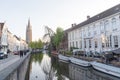 The tower of Church of Our Lady and canal in Brugge, Belgium Royalty Free Stock Photo