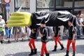 Marchers carrying giant arm in The 2012 Procession of the Golden Tree Pageant, held every 5 years since 1958.