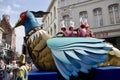 Marchers with a giant bird float in The Procession of the Golden Tree Pageant, held every 5 years since 1958.