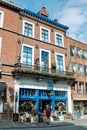 Bruges, Belgium - August 2010: View of a building housing the `Dag en Zonne` antique shop Royalty Free Stock Photo