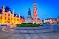 Bruges, Belgium. Blue hour in Grote Markt with Belfry, famous city of Flanders Royalty Free Stock Photo