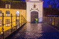 Bruges, Belgium - December 13, 2017: The Beguinage or Begijnhof along a canal across from Minnewater Park in the Royalty Free Stock Photo