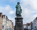 Statue of the Flemish painter Jan van Eyck in Bruges.