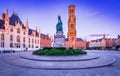 Bruges, Belgium. Grote Markt with Belfry, famous city of Flanders, blue hour colors Royalty Free Stock Photo