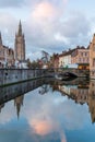 Bruges, Belgium iconic medieval houses, towers and Rozenhoedkaai canal. Classic postcard view of the historic city center. Often r