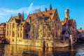 Bruges, Belgium. Image with Rozenhoedkaai in Brugge, Dijver river canal and Belfort (Belfry) tower Royalty Free Stock Photo