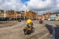 BRUGES, BELGIUM - JUNE 10, 2014: Cyclists in streets in Bruges Royalty Free Stock Photo