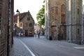 Historic cobbled street in medieval European city Bruges in Belgium Royalty Free Stock Photo