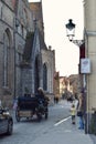 Horse drawn carriage touring visitors around Belgium\'s cobbled streets Royalty Free Stock Photo